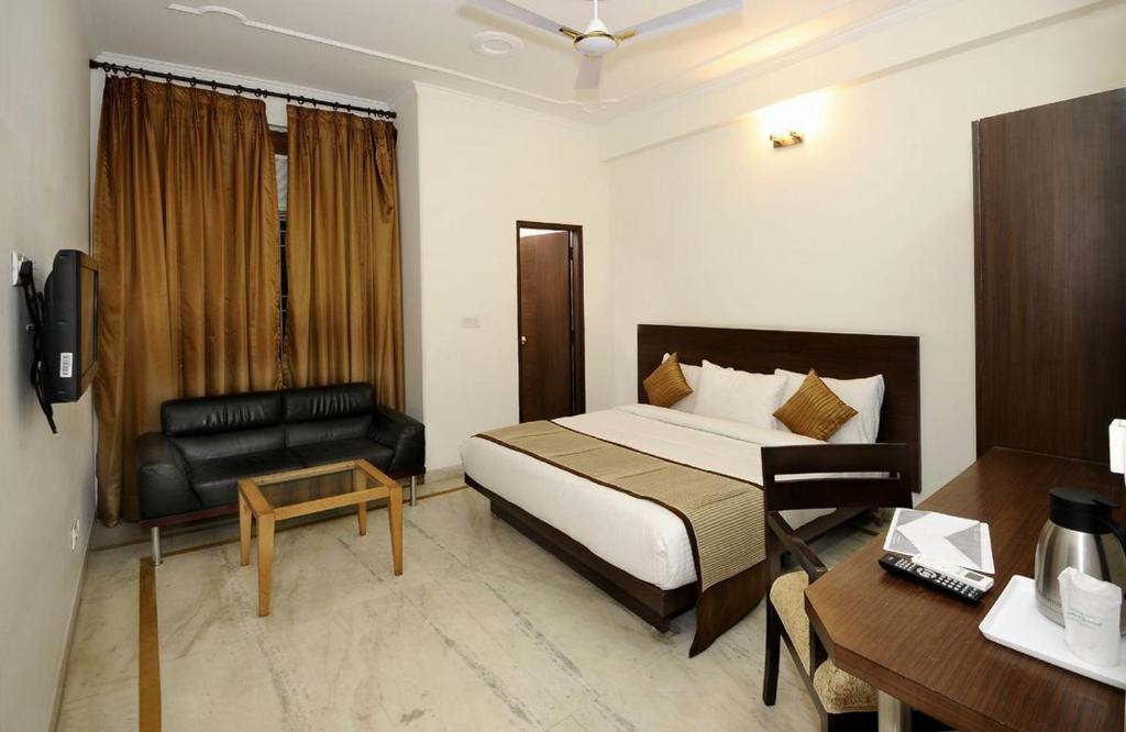 Airport Hotel Goodluck New Delhi Rum bild