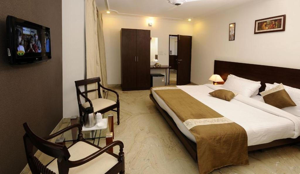 Airport Hotel Goodluck New Delhi Rum bild